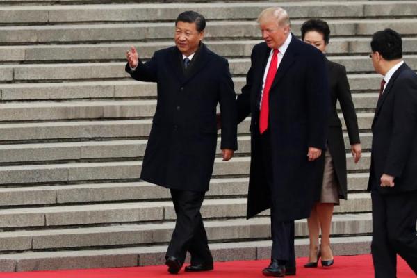 Trump di China, Bahas Cucunya yang Jago Nyanyi