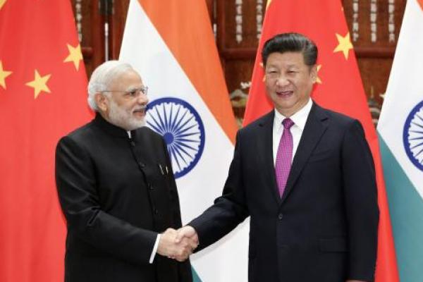 Presiden Tiongkok dan perdana menteri India pererat hubungan bilateral dalam pertemuan tak resmi.