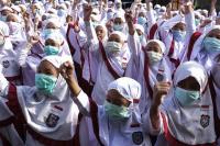 Jokowi Longgarkan Pemakaian Masker, Anggota DPR Minta Sekolah Tetap Jalankan Prokes